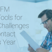 Woman and Man Smiling While Looking at Report and Wearing Headsets |Give Your WFM Supervisor Tools for Success: 3 Challenges Faced by Contact Centers this Year | Authority Software
